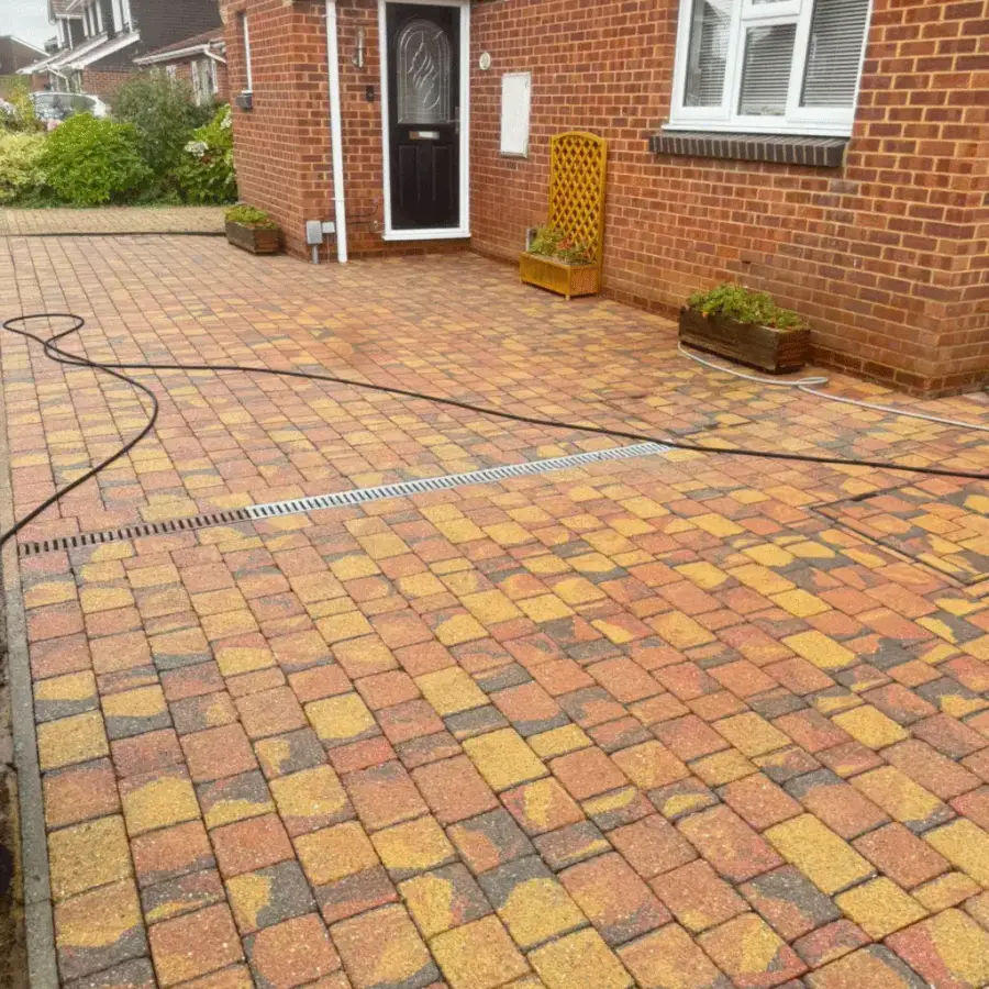 After — render soft washing removing black algae staining