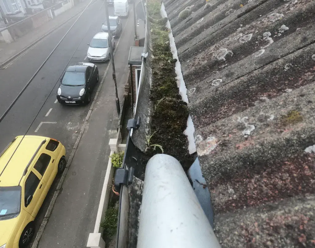 Before — fascia and soffit cleaning restoring bright white uPVC