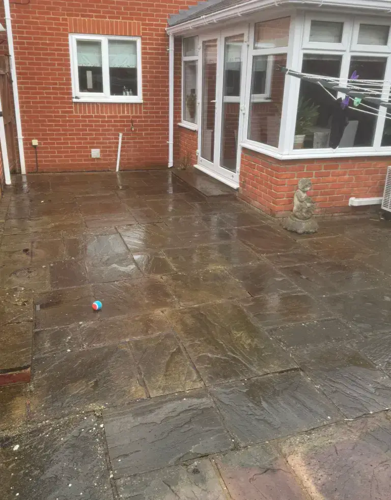 Before — block paving driveway cleaned and re-sanded