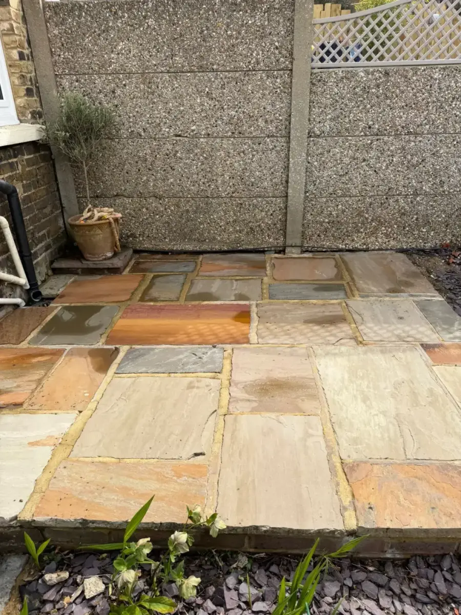 After — algae-stained path transformed by exterior cleaning