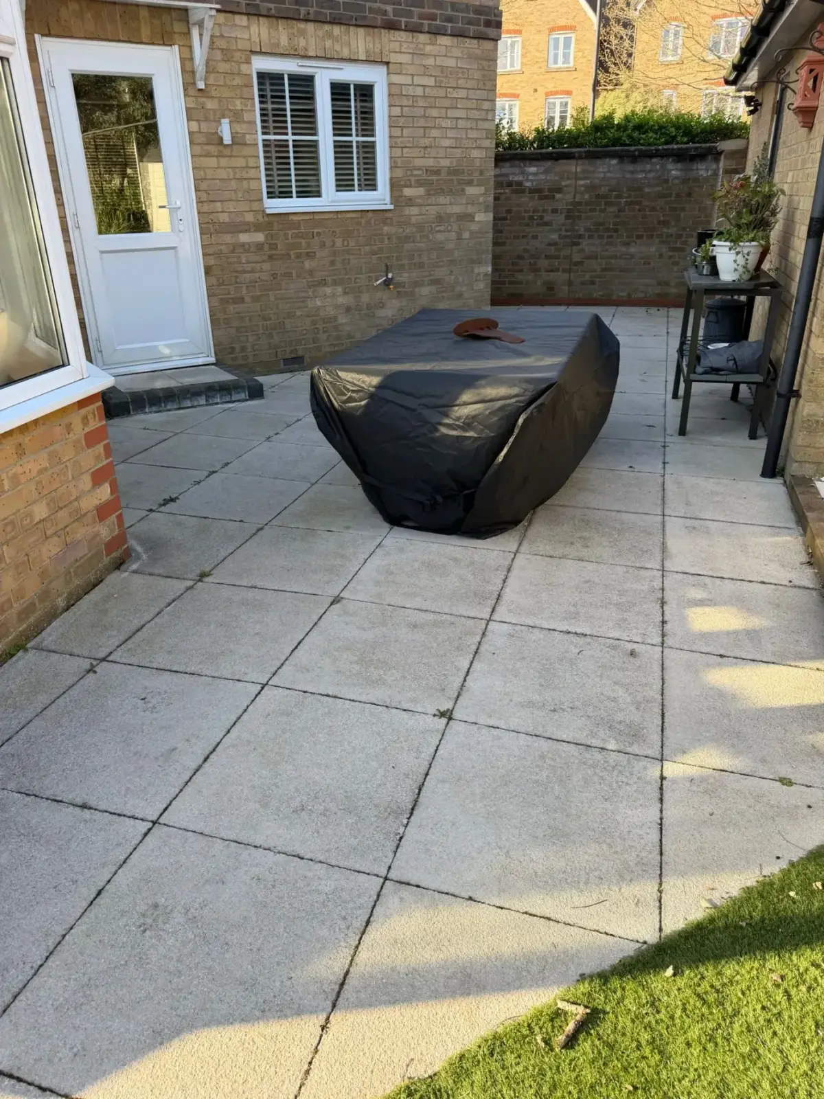 Before — patio slab jet washing and re-sanding