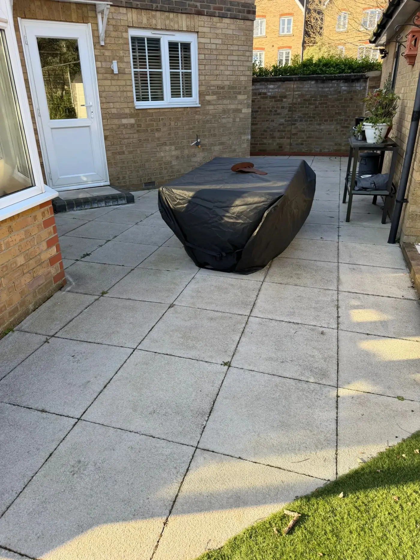 Before — patio slab jet washing and re-sanding